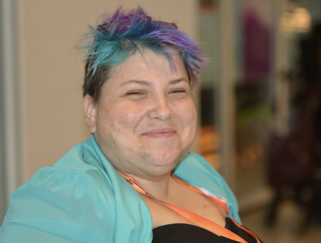 Photo of woman with disability who attended National forum.