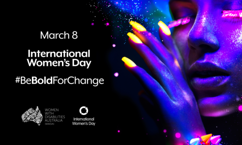 A portrait of a woman's face, eyes closed, her hand raised up to her face. The woman's face is lit with bold neon colours. The words March 8, International Women's Day and the #BeBoldForChange hashtag appear in bright text next to the image. The WWDA logo and IWD logo are centred in the bottom left of the image.