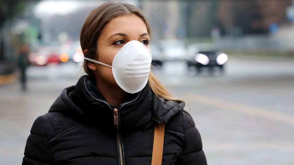 Photo of a woman wearing a face mask.