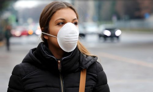 Photo of a woman wearing a face mask.