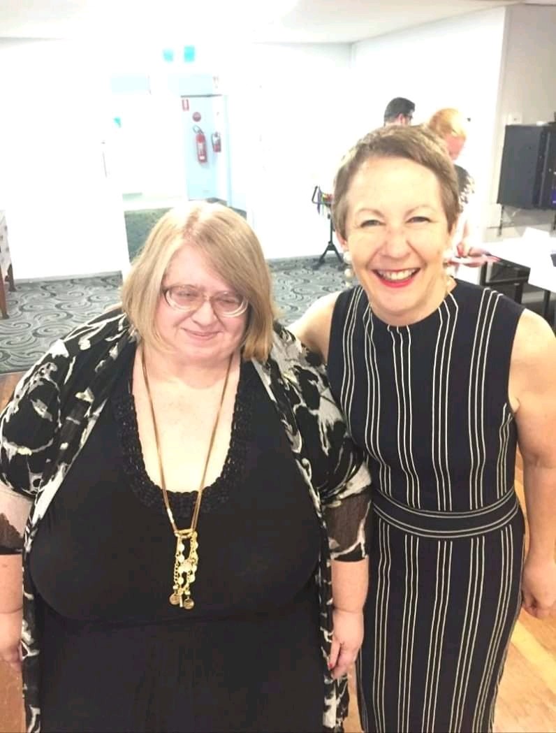 Photo of Leanne Claussen standing with Di Farmer, the Minister for child safety, youth and women, Minister for the prevention of domestic and family violence at the 2019 PeakCare Inaugural Awards