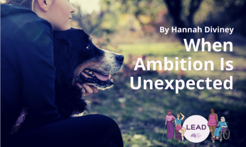 A photo of a woman hugging her dog. White text reads ' By Hannah Diviney, When Ambition is Unexpected'.
